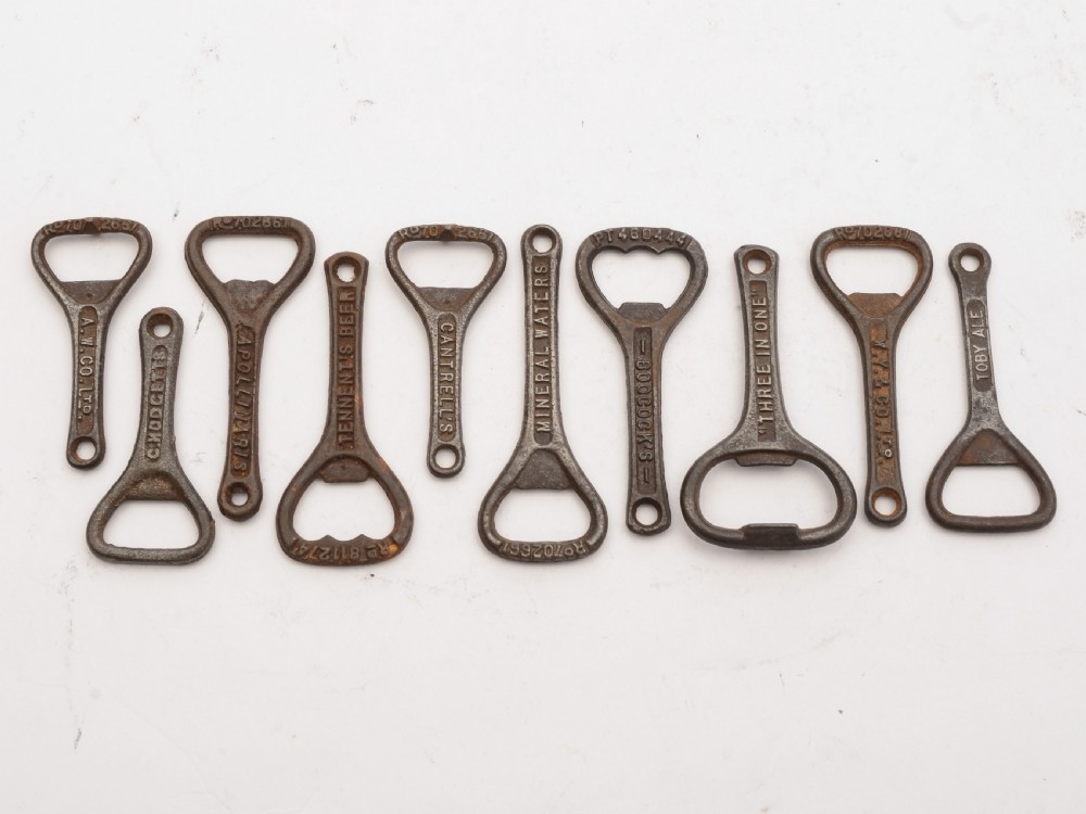 Collection of 40 Advertising Cast Iron Bottle Openers, Circa 1920 View II