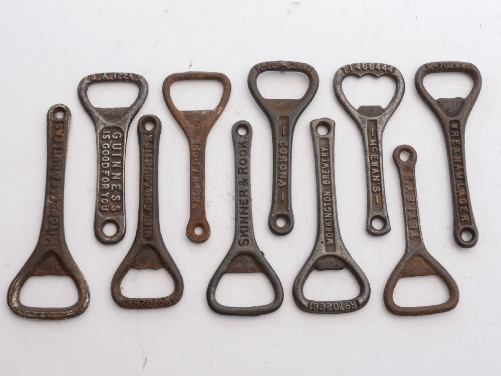 Collection of 40 Advertising Cast Iron Bottle Openers, Circa 1920 View III
