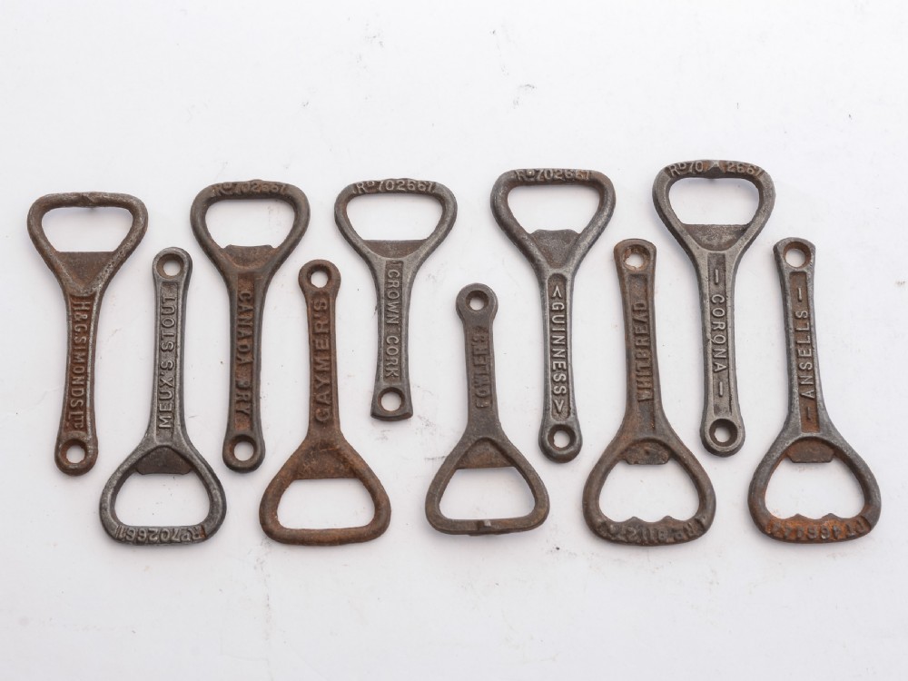 Collection of 40 Advertising Cast Iron Bottle Openers, Circa 1920 View IV