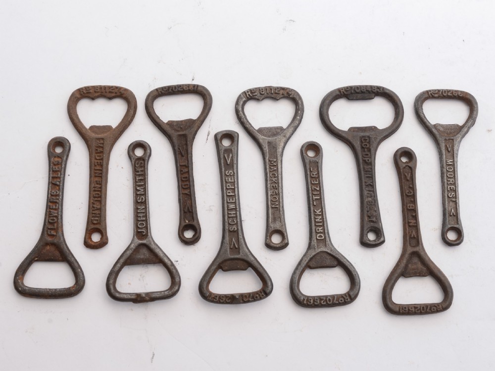 Collection of 40 Advertising Cast Iron Bottle Openers, Circa 1920 View V