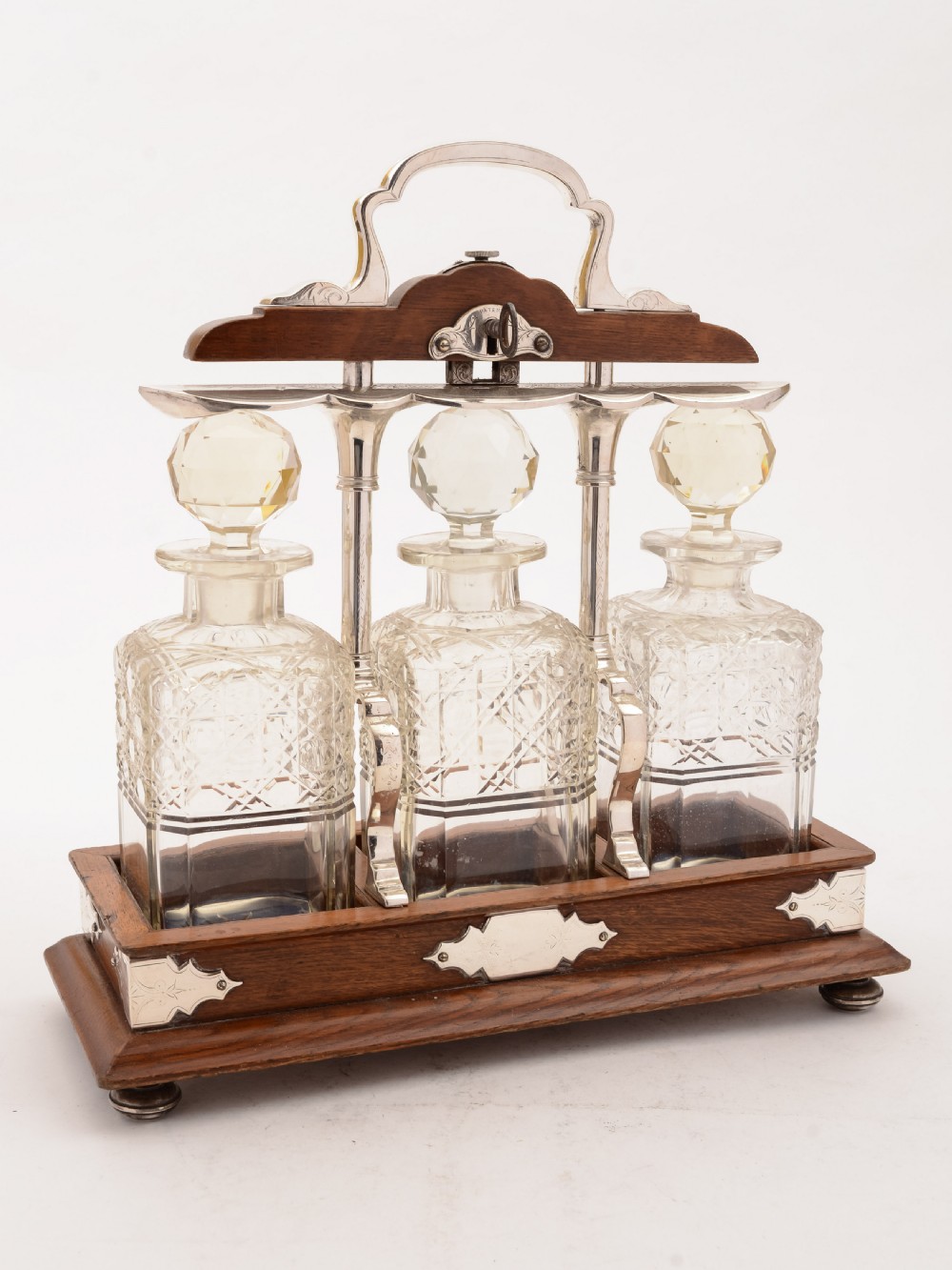 Grand Victorian 3 Bottle Tantalus, Circa 1890