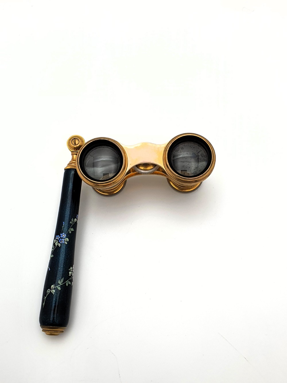 Edwardian opera glasses featuring black enamelled barrels with hand-painted floral patterns, mother of pearl eyepieces, lacquered brass fittings, and an extendable side handle. View II
