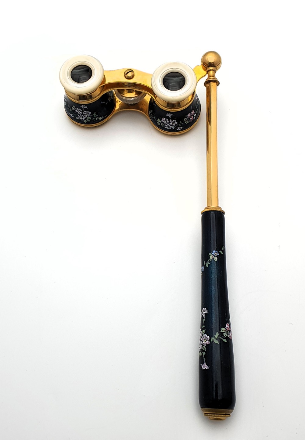Edwardian opera glasses featuring black enamelled barrels with hand-painted floral patterns, mother of pearl eyepieces, lacquered brass fittings, and an extendable side handle. View VIII