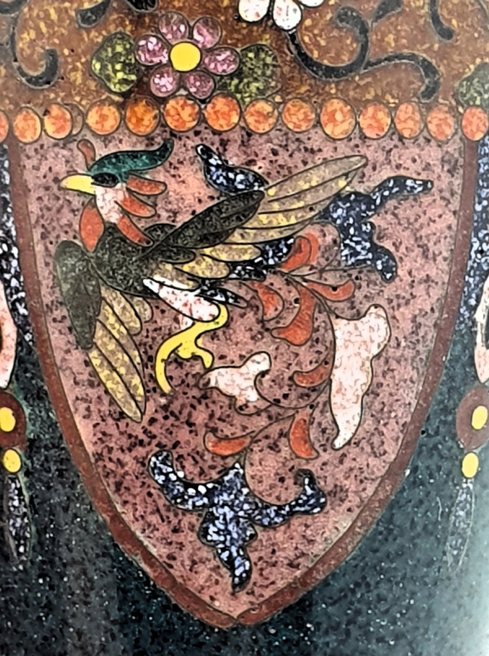 A pair of small dark brown Japanese cloisonne enamel vases decorated with bird and floral motifs. View III