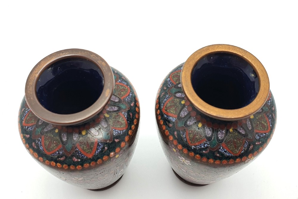 A pair of small dark brown Japanese cloisonne enamel vases decorated with bird and floral motifs. View VIII