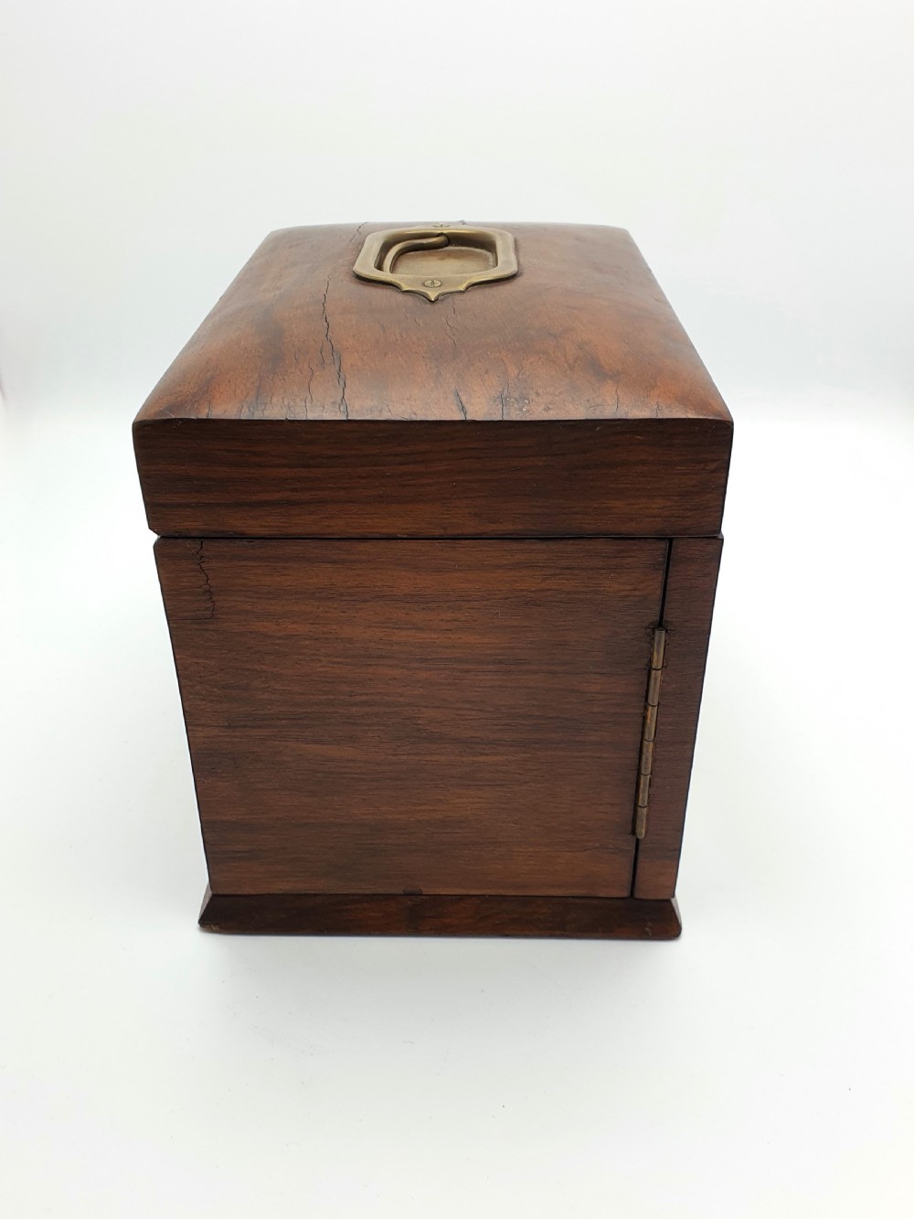 A Victorian walnut jewellery chest with open glass-panelled side doors, two pull-out drawers with brass handles, and an open lid revealing a button-tufted green velvet interior. View VIII