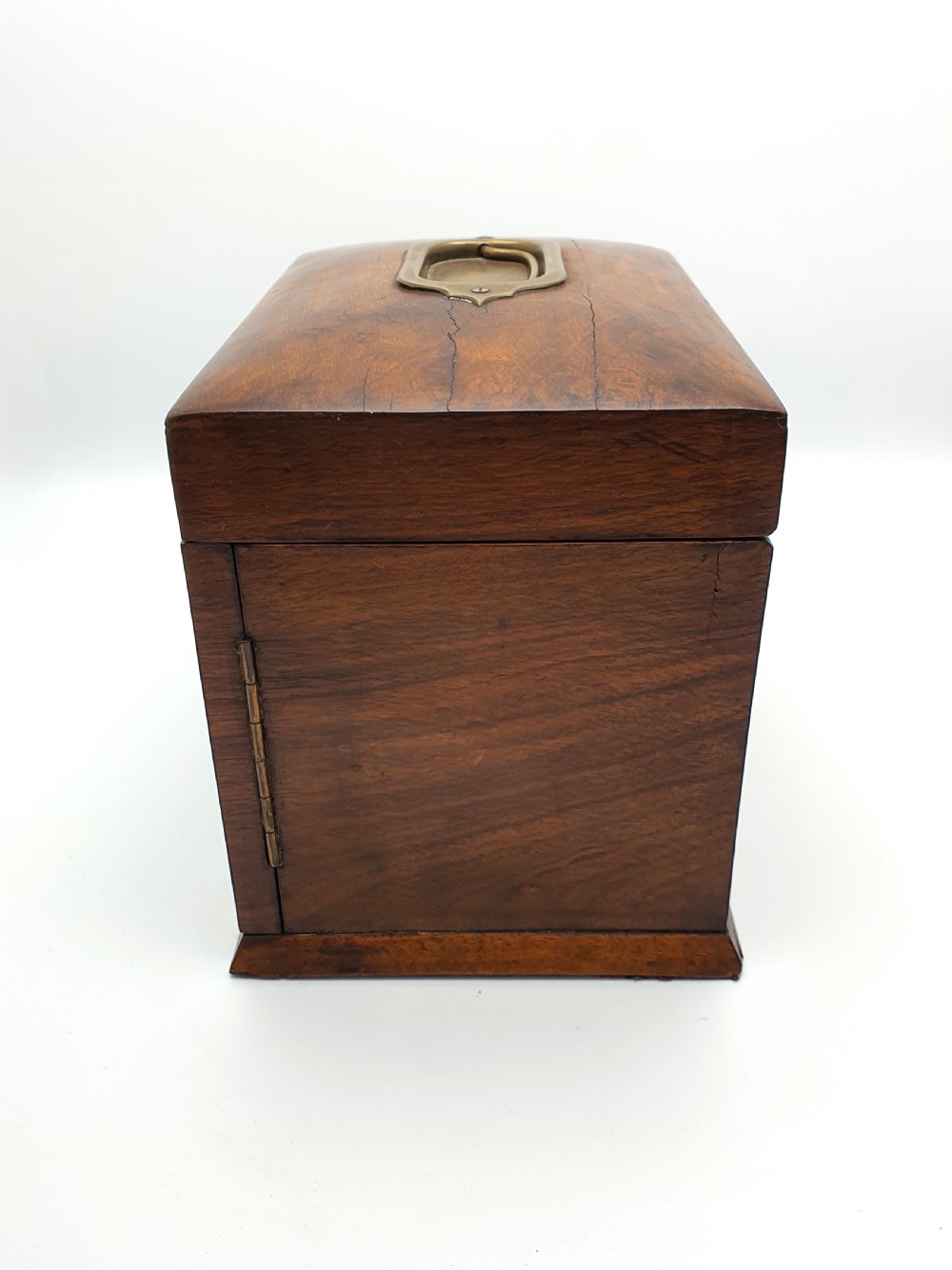 A Victorian walnut jewellery chest with open glass-panelled side doors, two pull-out drawers with brass handles, and an open lid revealing a button-tufted green velvet interior. View X