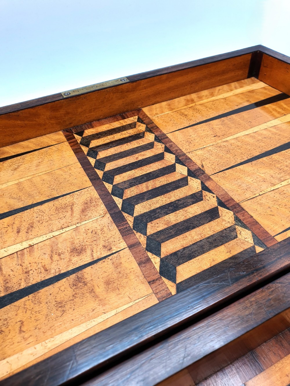 A Victorian folding wooden games box featuring a hand-inlaid checkered chessboard surface surrounded by figured timber borders. View IV