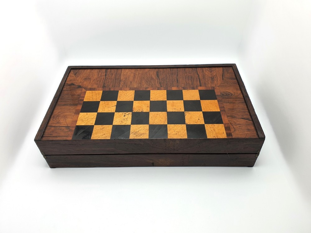 A Victorian folding wooden games box featuring a hand-inlaid checkered chessboard surface surrounded by figured timber borders. View VIII