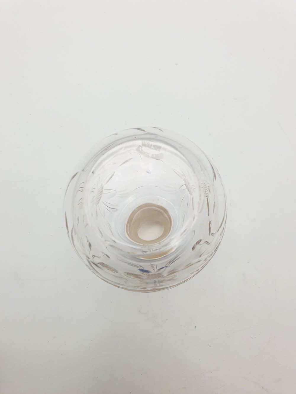 A clear cut glass scent bottle featuring a bright blue guilloche enamel collar and matching octagonal stopper set in sterling silver. View VII