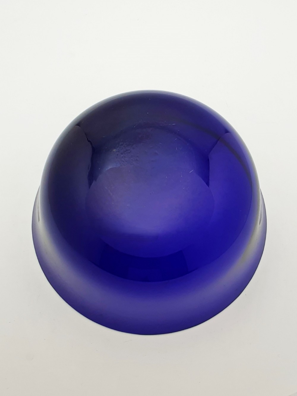 A German 800 silver centrepiece bowl featuring a pierced leaf and vine motif frame on a pedestal base with a cobalt blue glass liner. View VI