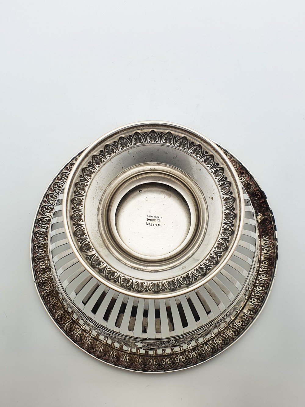 A German 800 silver centrepiece bowl featuring a pierced leaf and vine motif frame on a pedestal base with a cobalt blue glass liner. View VIII