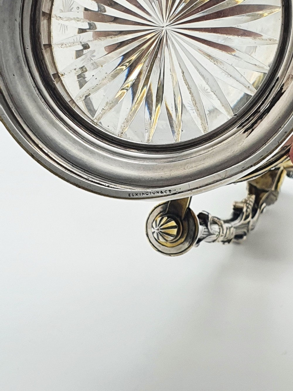 A tall Victorian silver-plated and etched glass claret jug featuring classical reliefs, a Greek key border, and star-cut engravings. View XI