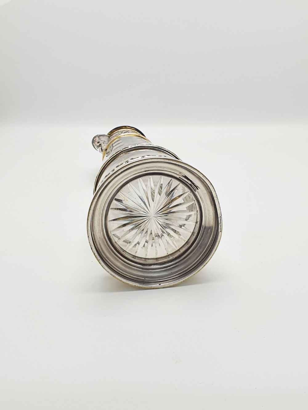 A tall Victorian silver-plated and etched glass claret jug featuring classical reliefs, a Greek key border, and star-cut engravings. View XIII