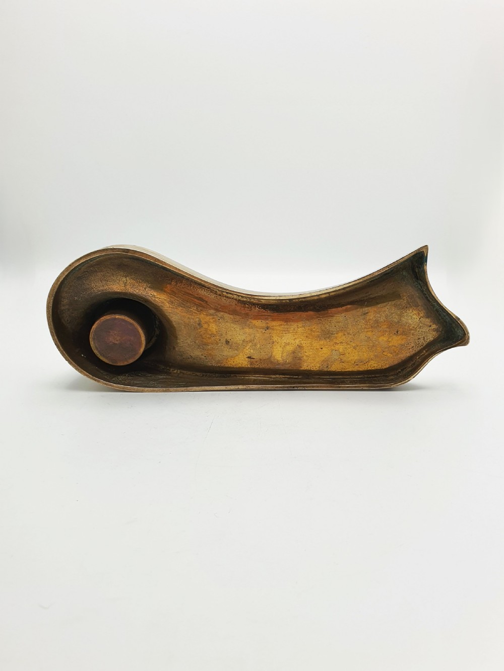 An Art Nouveau cast bronze inkwell featuring a hinged lid, organic curved pen rest tray, and decorative beaded back gallery. View X
