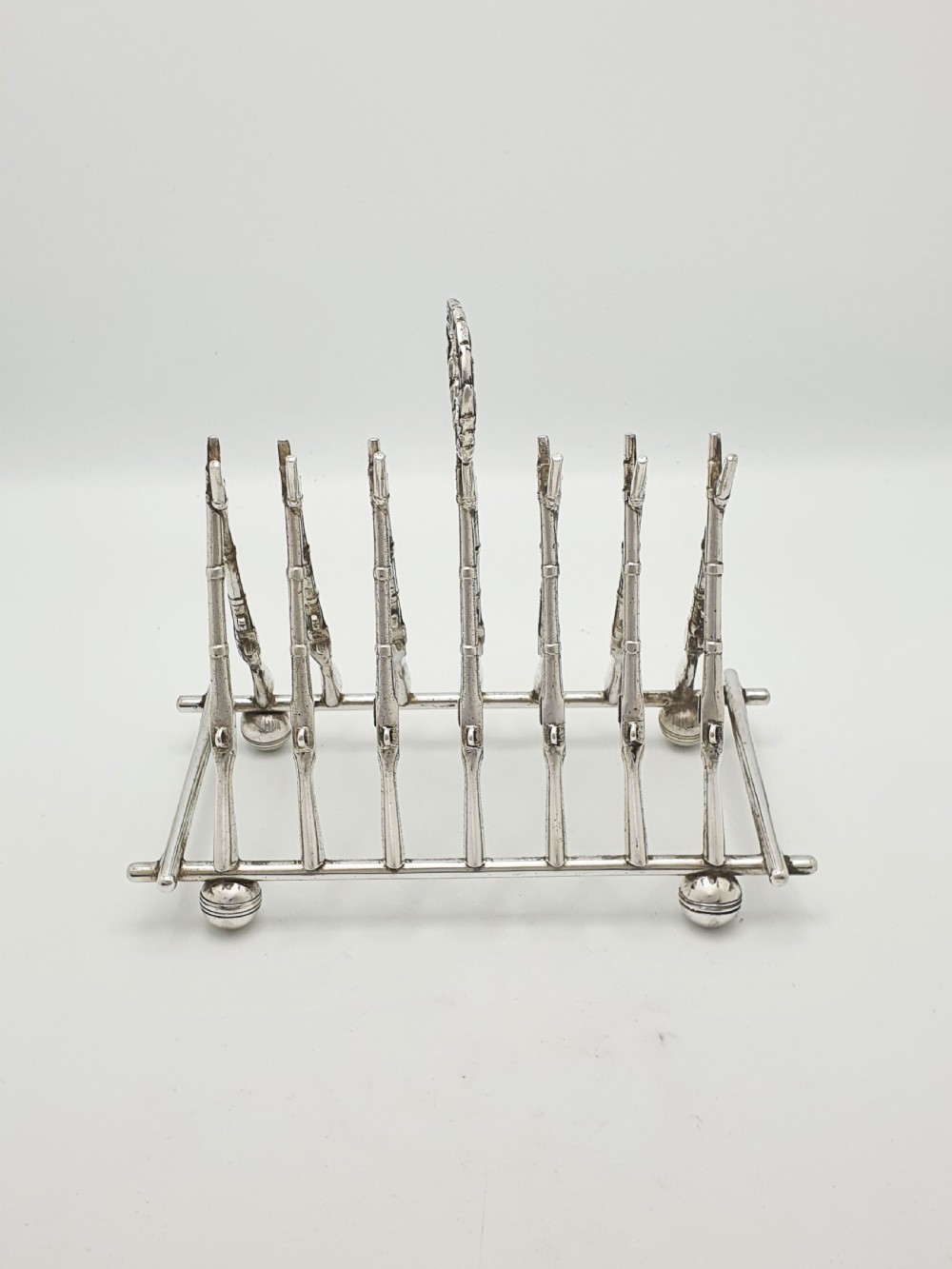 Antique Victorian Rifle-Form Toast Rack with Laurel Wreath Handle – circa 1880 View V