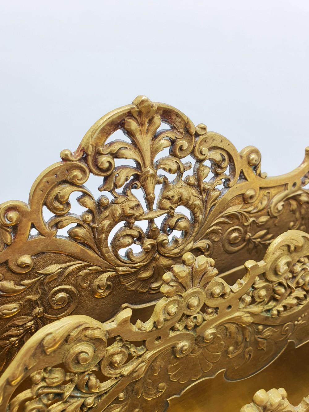A cast brass Rococo Revival letter rack featuring three tiered compartments with intricate pierced scrollwork and foliate cresting. View IV