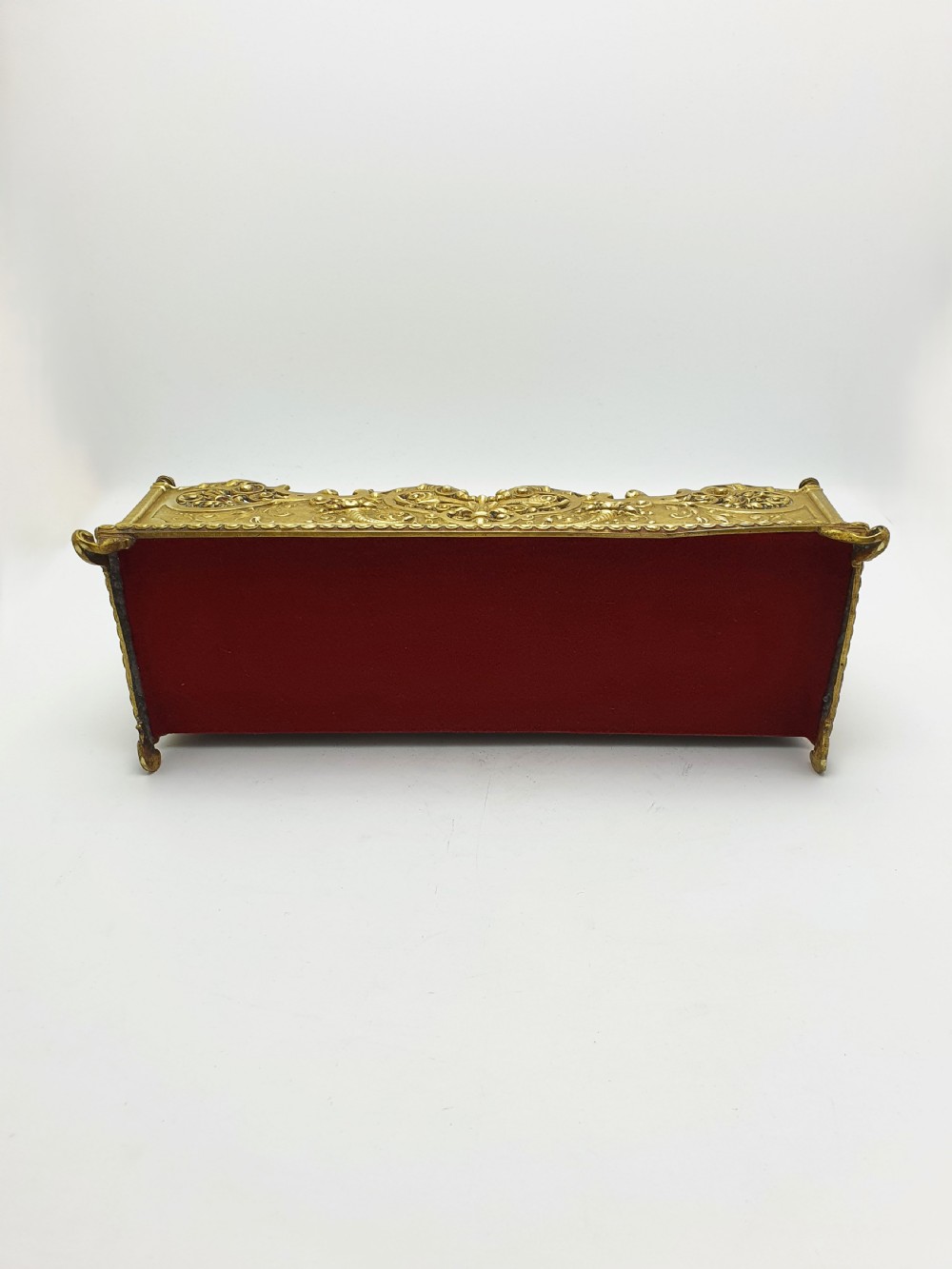 A cast brass Rococo Revival letter rack featuring three tiered compartments with intricate pierced scrollwork and foliate cresting. View XII