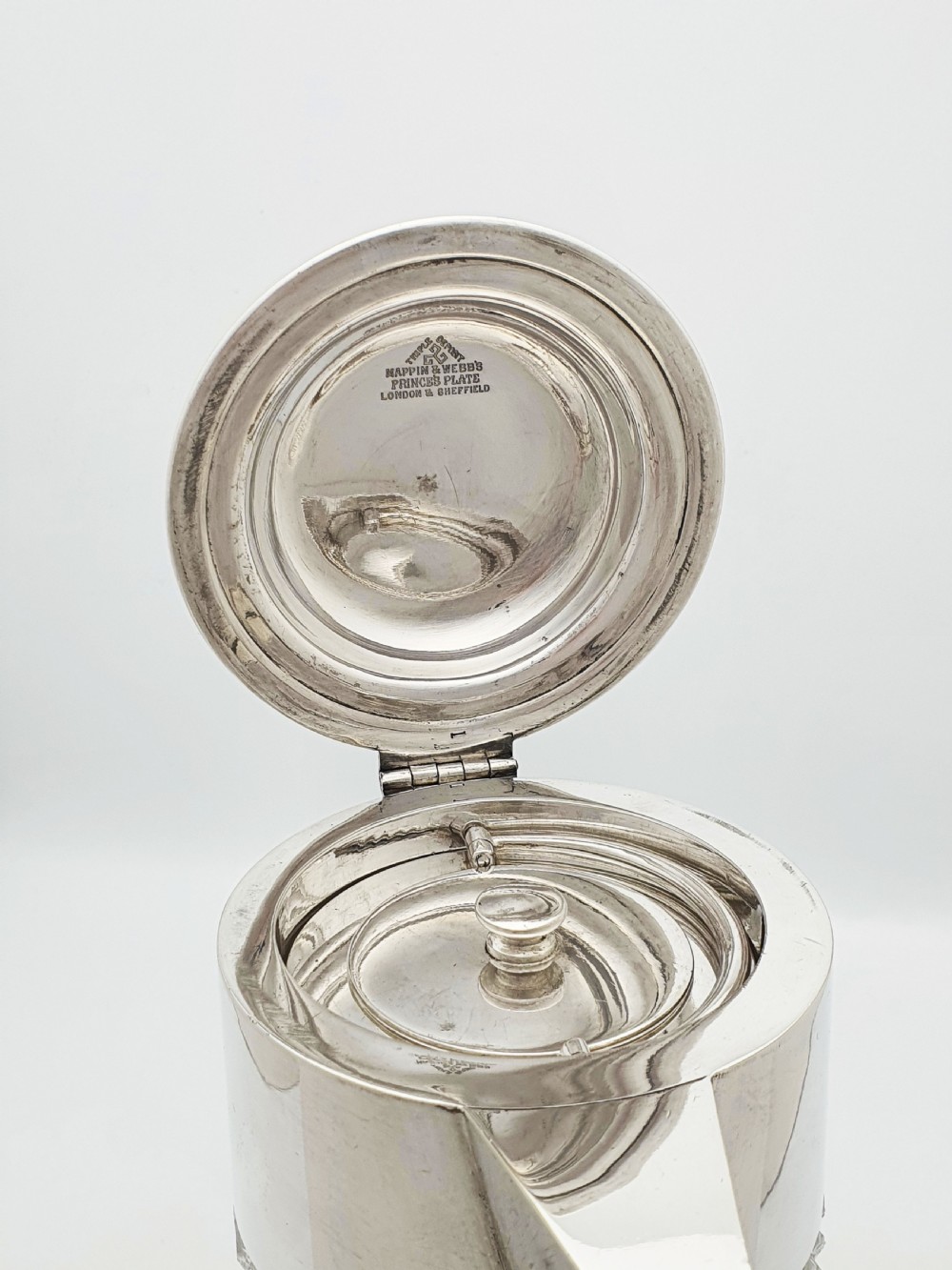 An antique Victorian cut glass lemonade jug featuring a silver-plated hinged lid and spout alongside its removable clear glass ice tube insert. View V