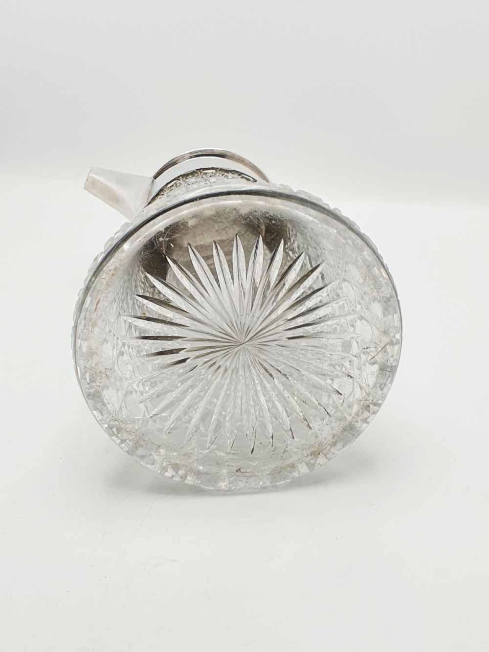 An antique Victorian cut glass lemonade jug featuring a silver-plated hinged lid and spout alongside its removable clear glass ice tube insert. View X