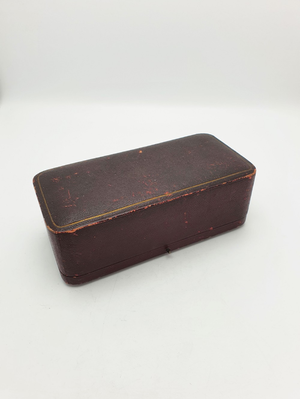 A pair of Victorian sterling silver open salt cellars with repousse leaf decoration and matching silver spoons in a velvet-lined maroon fitted box. View XI