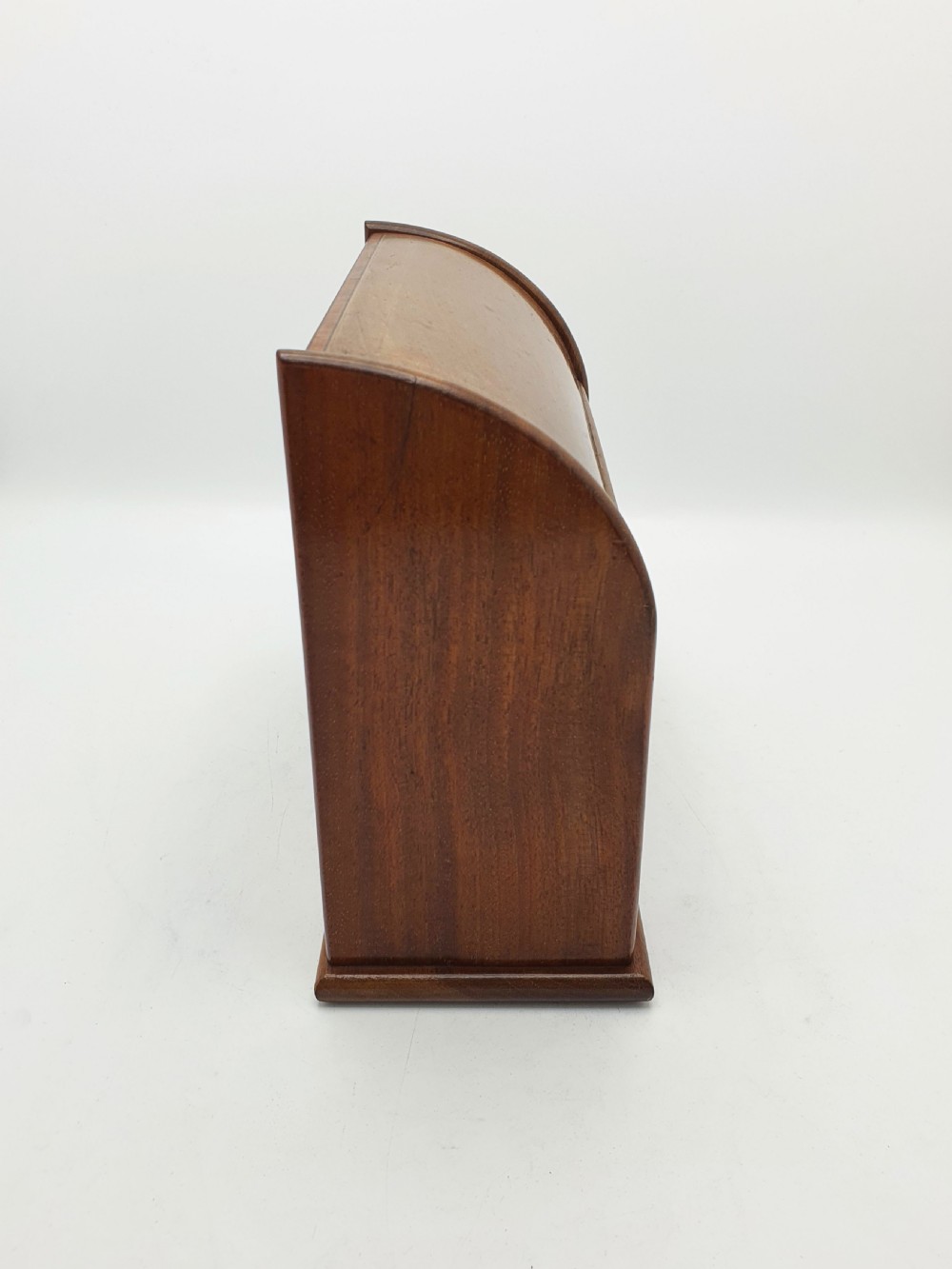 An antique Edwardian mahogany desk tidy featuring a hinged slanted lid, internal letter dividers, and line-inlaid boxwood detail on the front. View IX