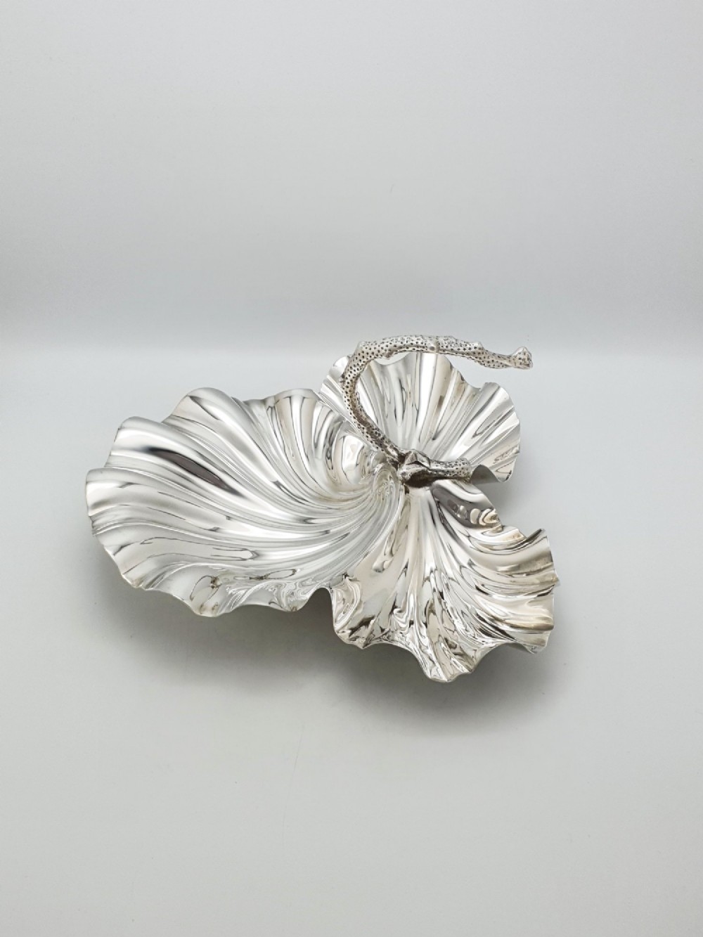 A Victorian silver-plated dish featuring two fluted shell-shaped compartments joined by a central handle modelled as textured coral. View III