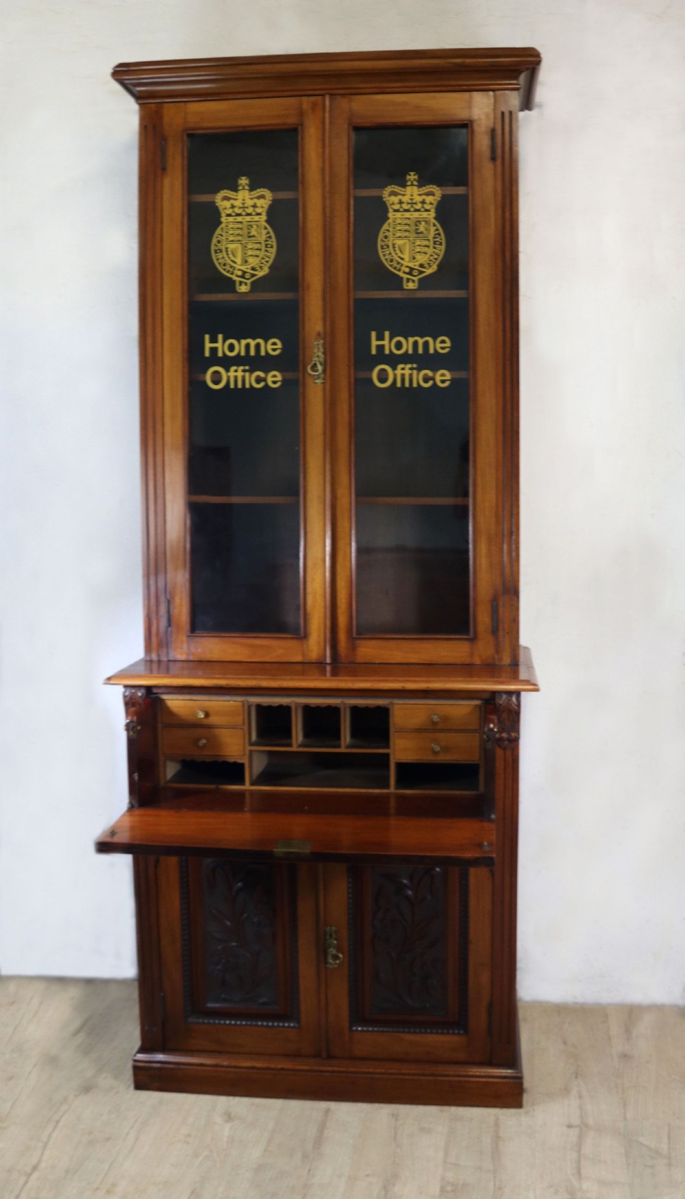 Late Victorian American walnut secretaire bookcase cabinet.