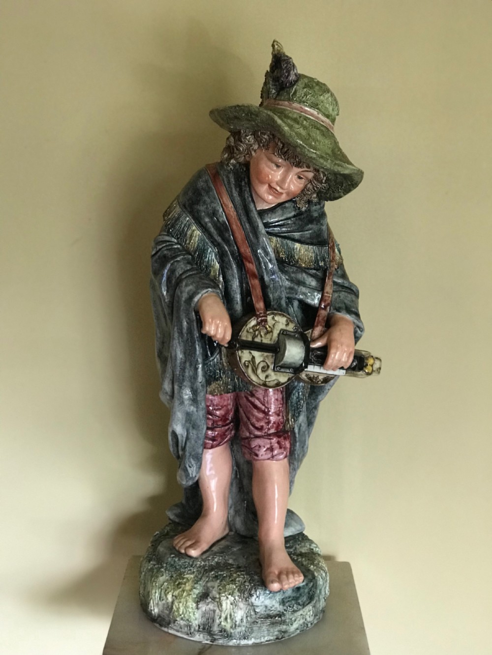 Majolica figure of a girl 