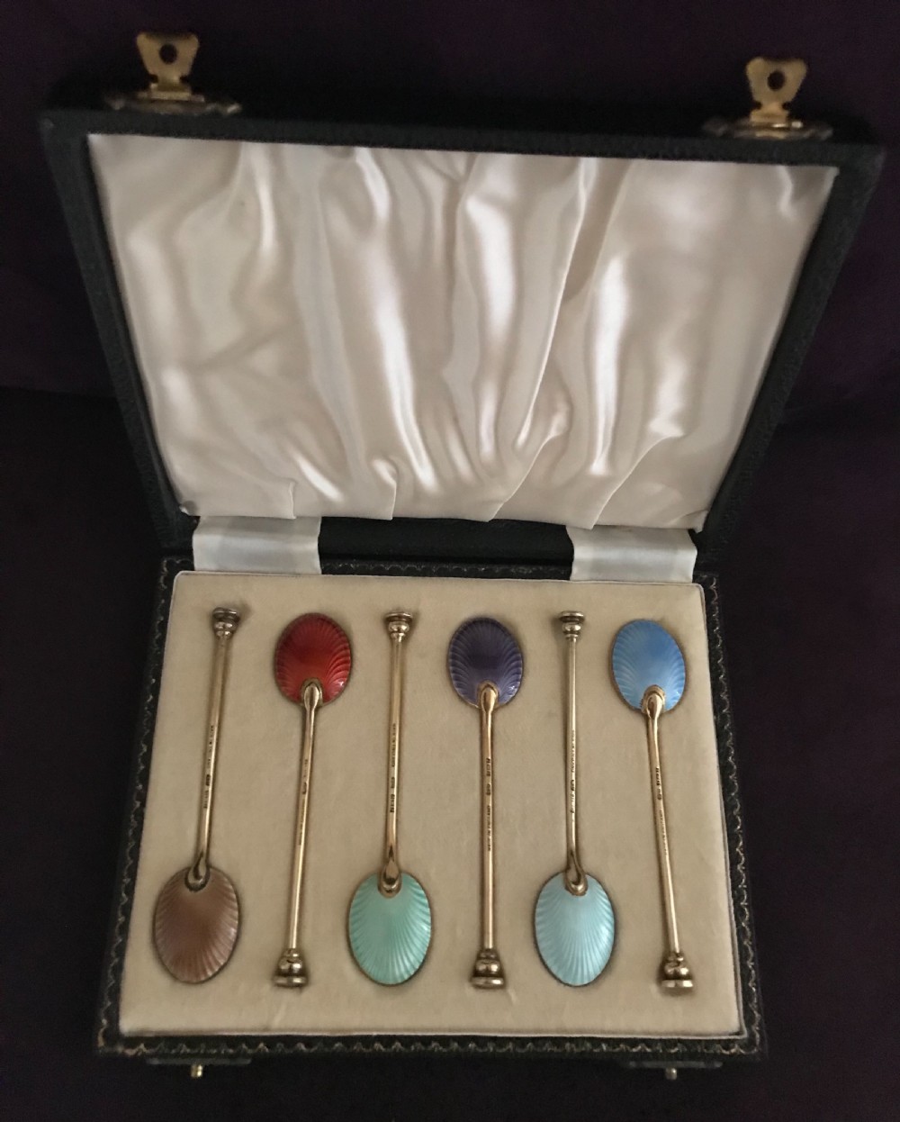 An English set of enamel teaspoons