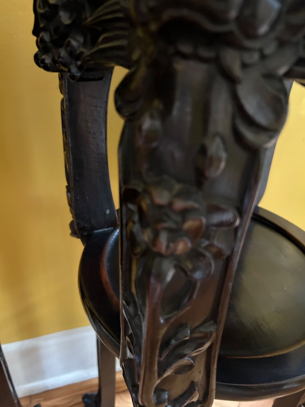 A pair of octagonal Chinese dark padouk wood plant stands with inset marble tops, pierced openwork aprons, lower shelves, and claw feet. View IV