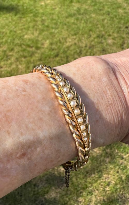 ANTIQUE 15 CARAT GOLD BANGLE SET WITH SEED PEARLS