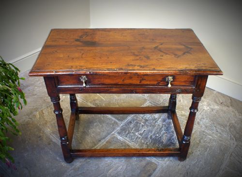 A Rare Late 17th Century Yew Wood Side Table.