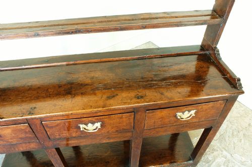 fig 1. A Small Georgian Oak Potboard Dresser and Rack.