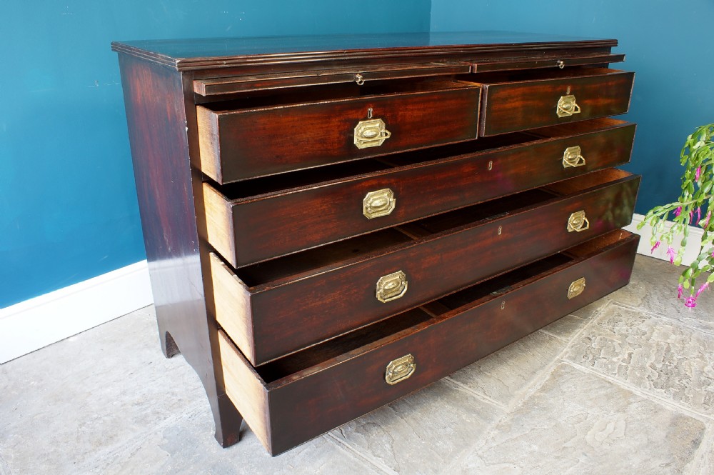 A George III mahogany chest of drawers View IV