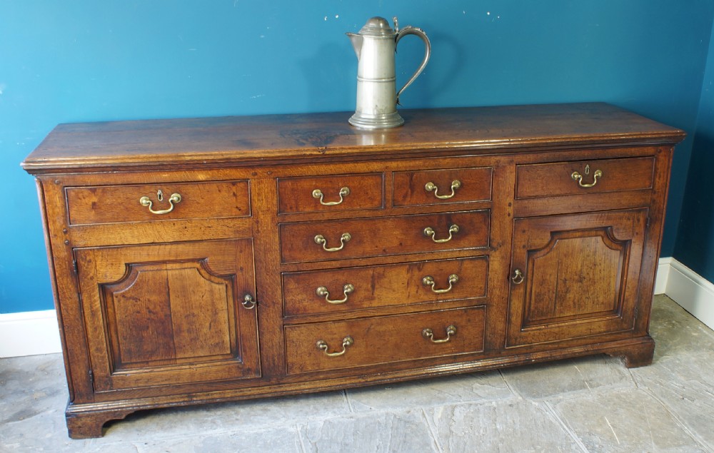 A superb large English 18th Century Oak Dresser base. View II