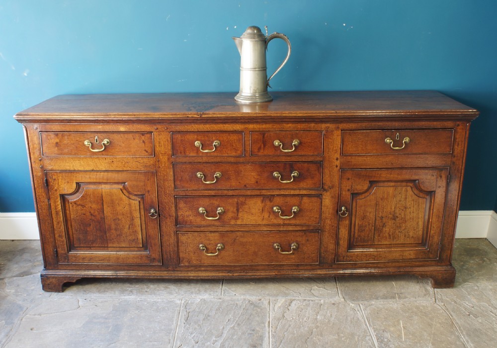 A superb large English 18th Century Oak Dresser base. View XIV
