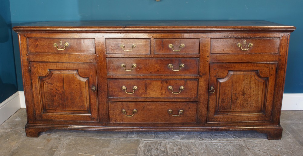 A superb large English 18th Century Oak Dresser base. View XII