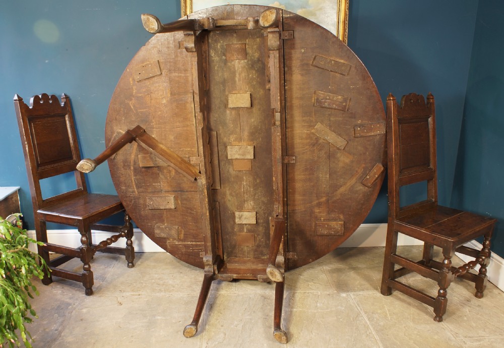 A large 18th Century Oak drop leaf table. View II