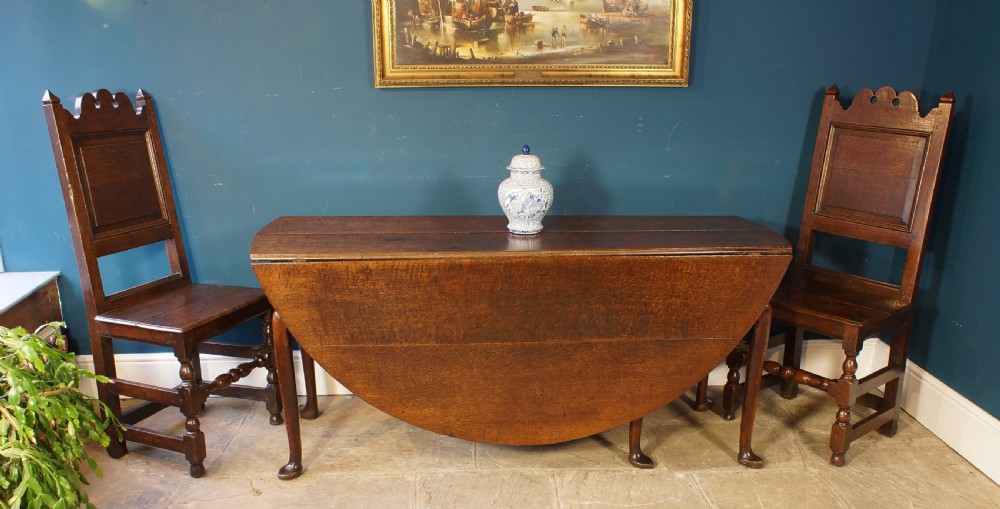 A large 18th Century Oak drop leaf table. View III