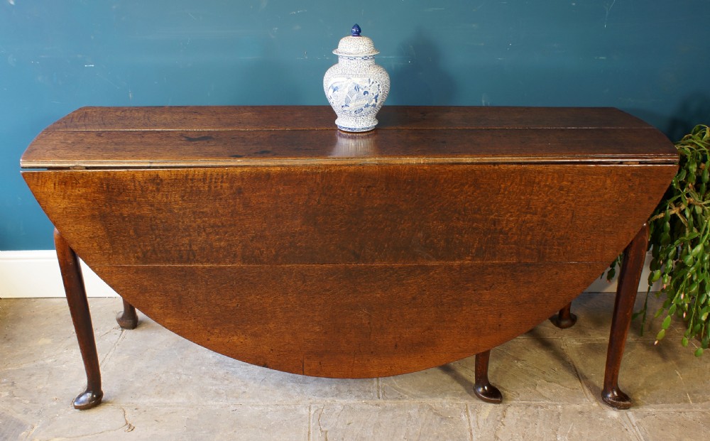 A large 18th Century Oak drop leaf table. View IV