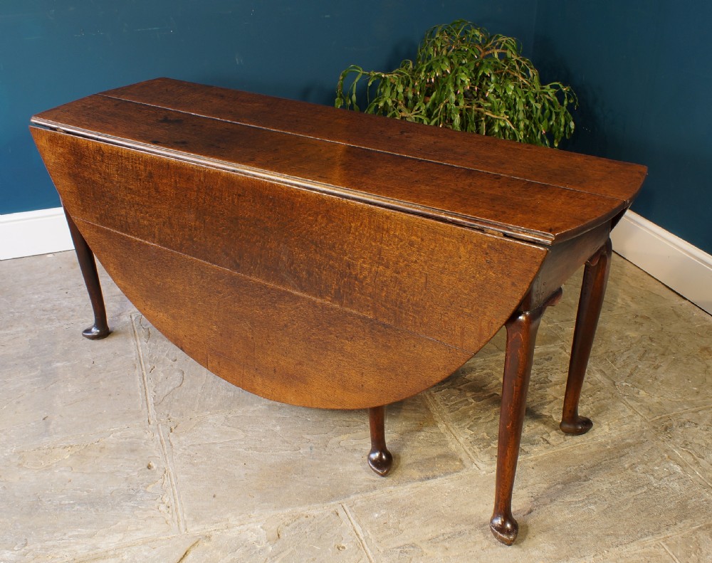 A large 18th Century Oak drop leaf table. View V