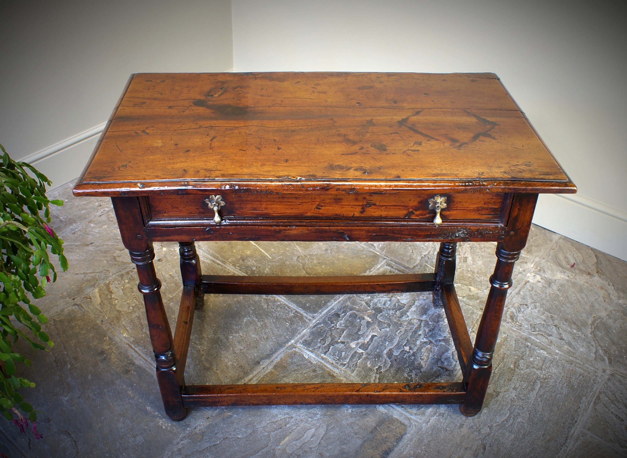 A Rare Late 17th Century Yew Wood Side Table.