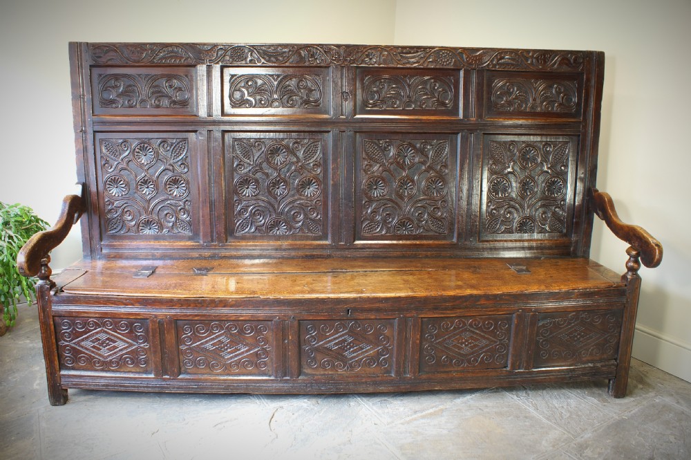 An Exceptional 17th Century Oak  Box Settle. View XIII