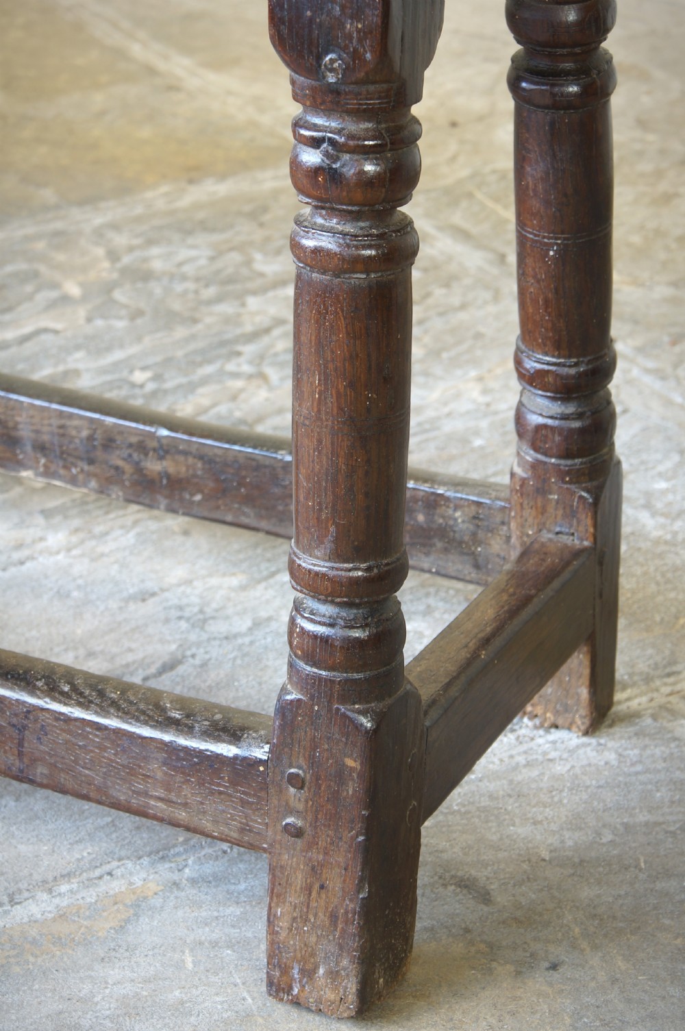 A 17th CENTURY JOINED OAK FORM OR BENCH, CIRCA 1640. View VII