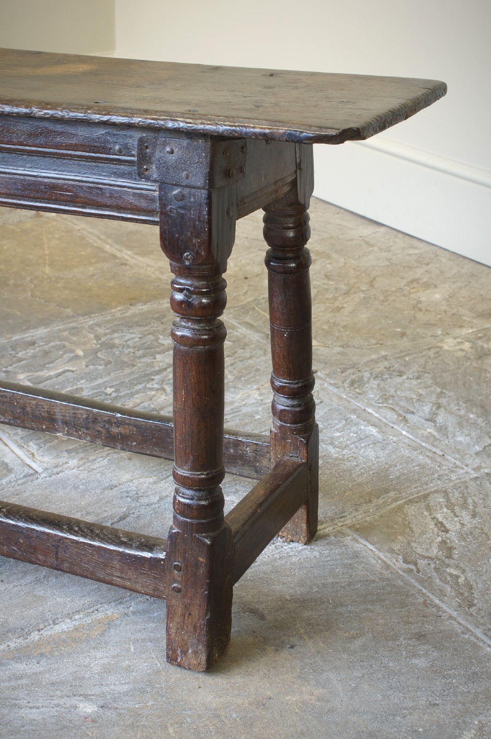 A 17th CENTURY JOINED OAK FORM OR BENCH, CIRCA 1640. View VIII