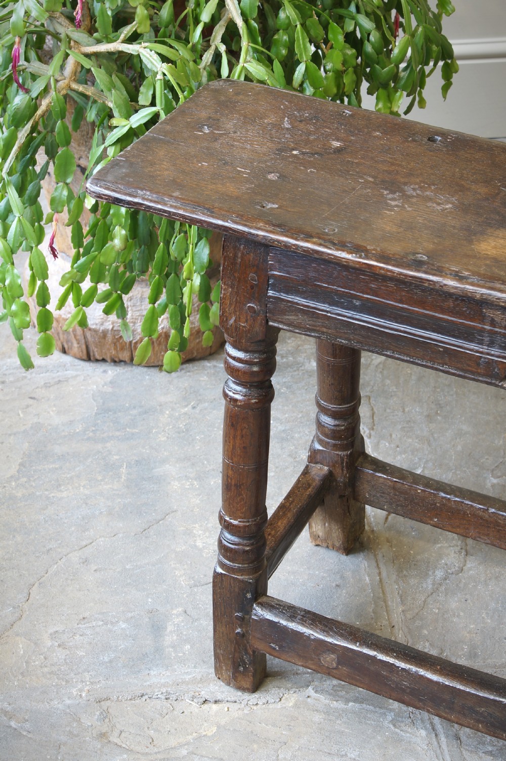 A 17th CENTURY JOINED OAK FORM OR BENCH, CIRCA 1640. View X