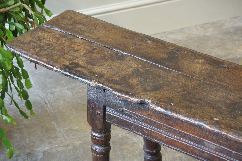 A 17th CENTURY JOINED OAK FORM OR BENCH, CIRCA 1640. View XI