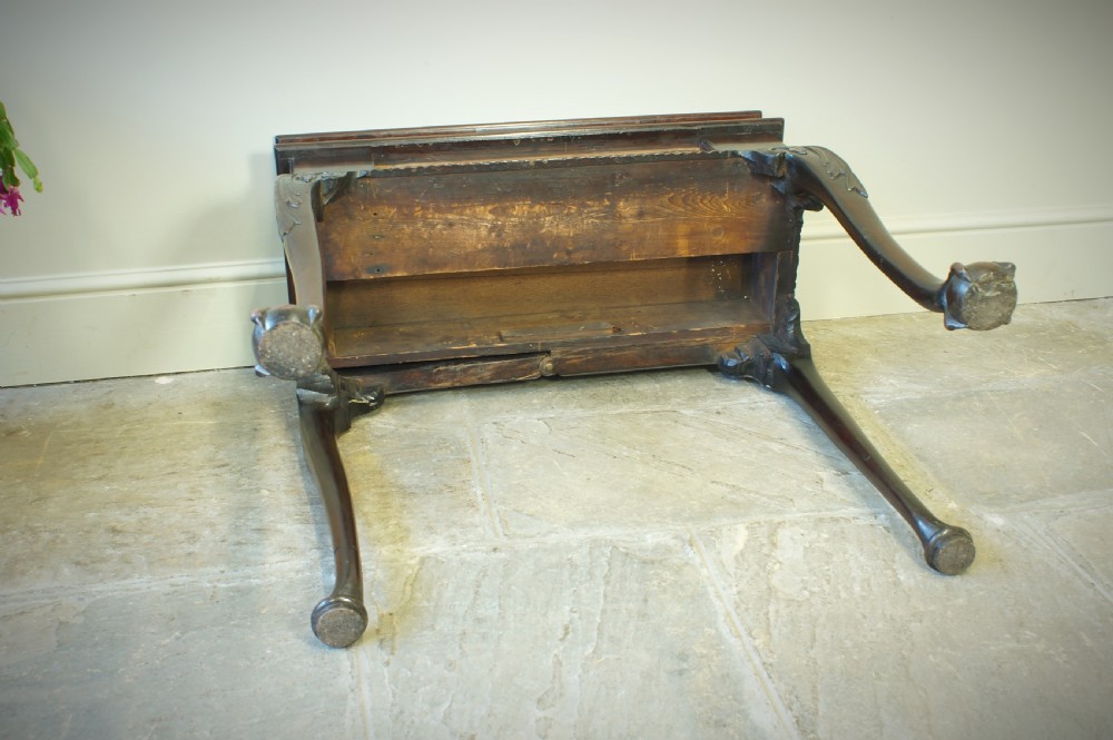A George II mahogany fold-over card table featuring carved cabriole legs with ball-and-claw feet and a central drawer. View VII