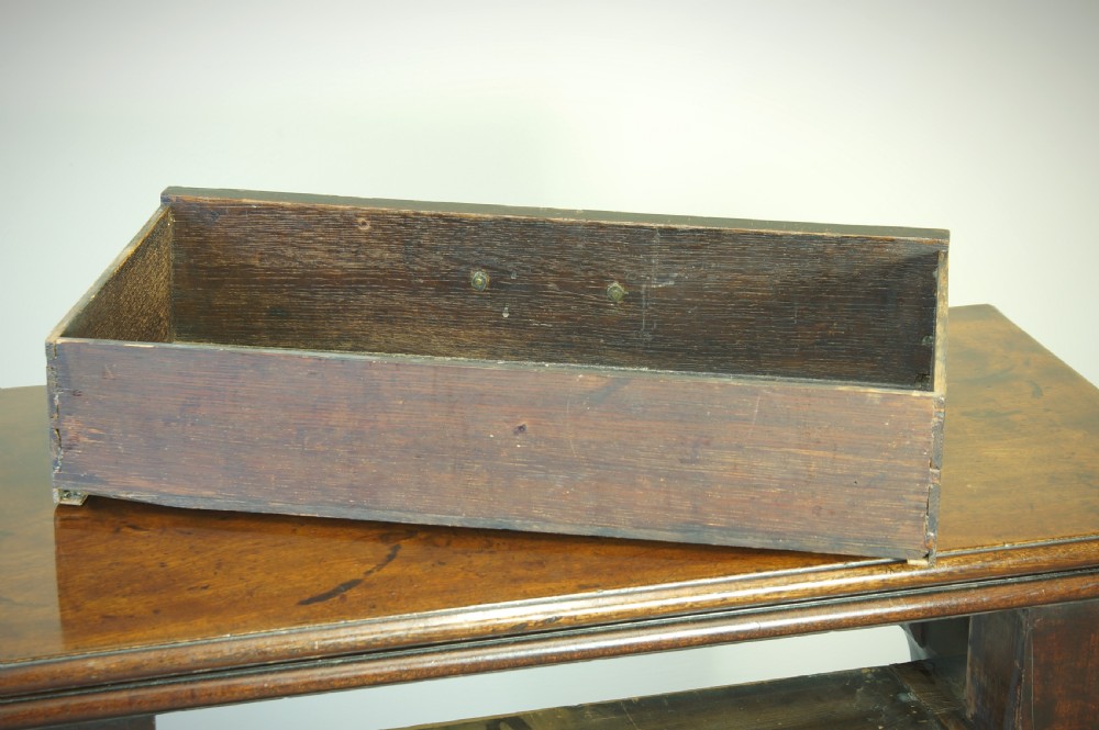 A George II mahogany fold-over card table featuring carved cabriole legs with ball-and-claw feet and a central drawer. View IX